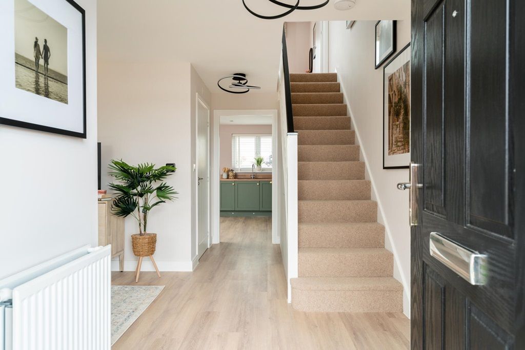 Property photo 2 of 12 A Light-Filled Hallway To Welcome You Home