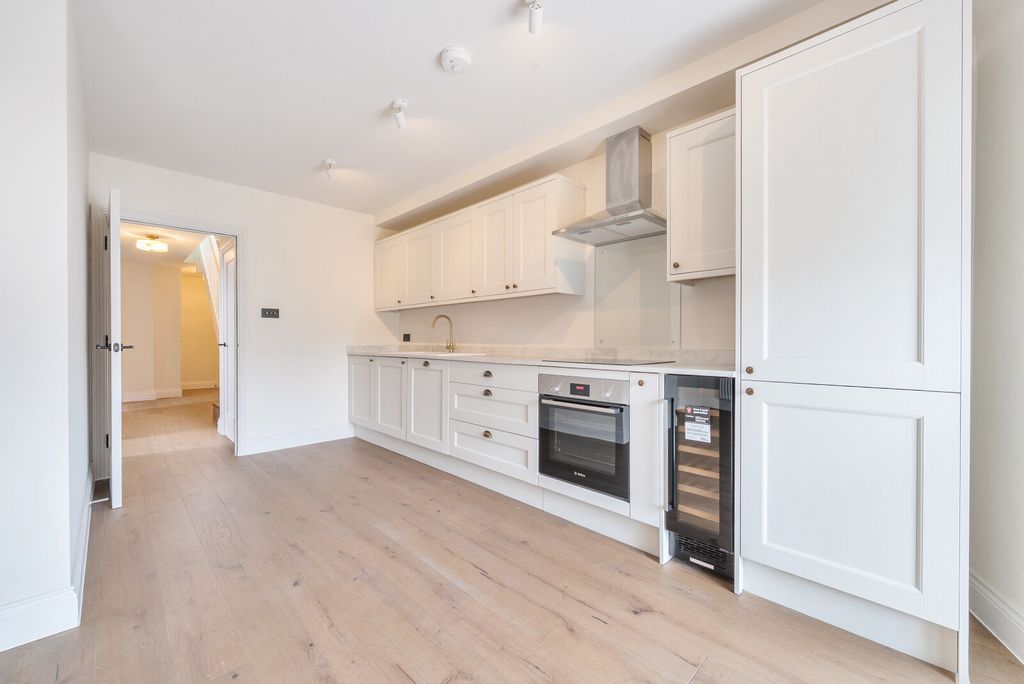 Property photo 3 of 16 Kitchen