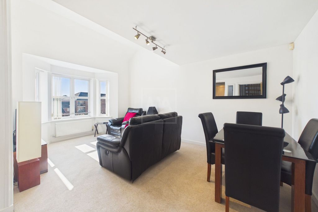 Property photo 2 of 12 Lounge/Dining Area