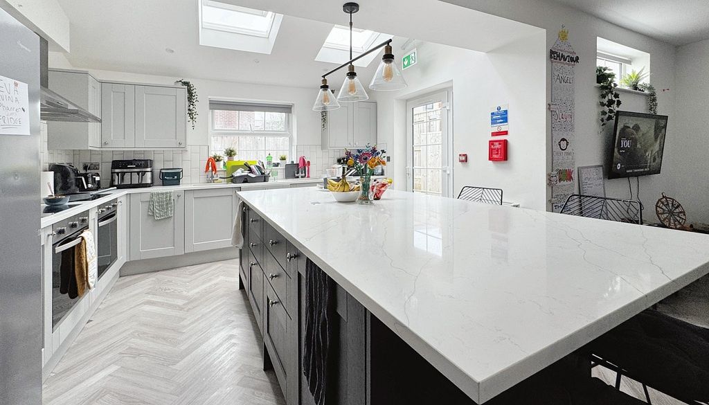 Property photo 2 of 15 Bright, Modern Kitchen With A Large Central Island...