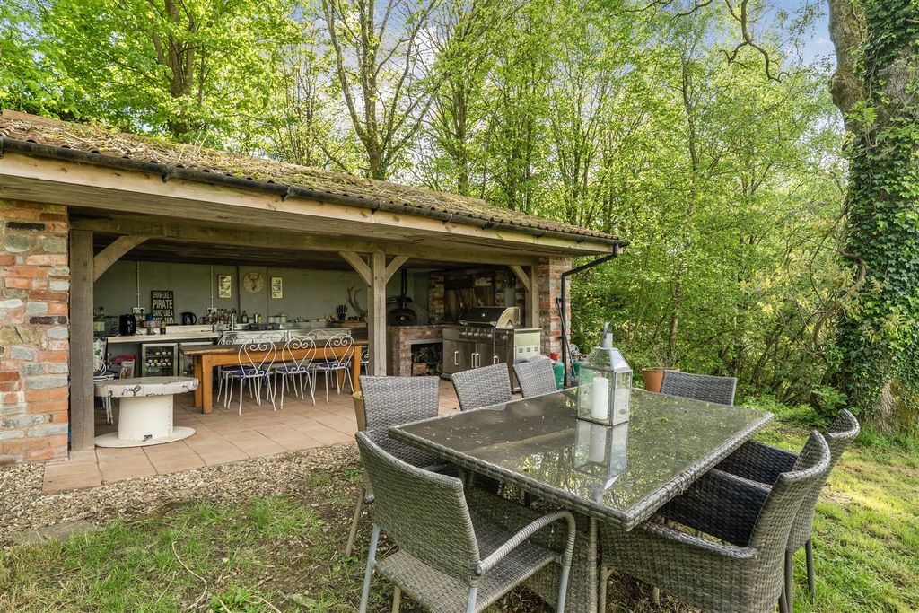 Property photo 3 of 35 Outdoor Kitchen/Dining Room
