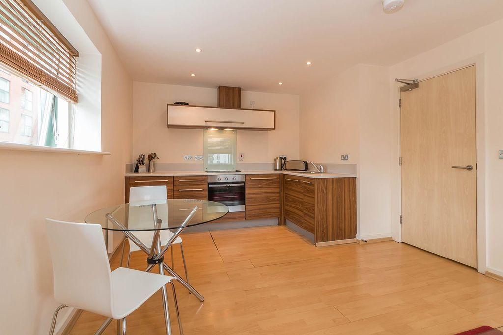 Property photo 3 of 7 Kitchen