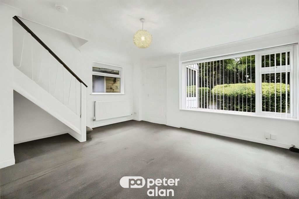 Property photo 3 of 18 Front