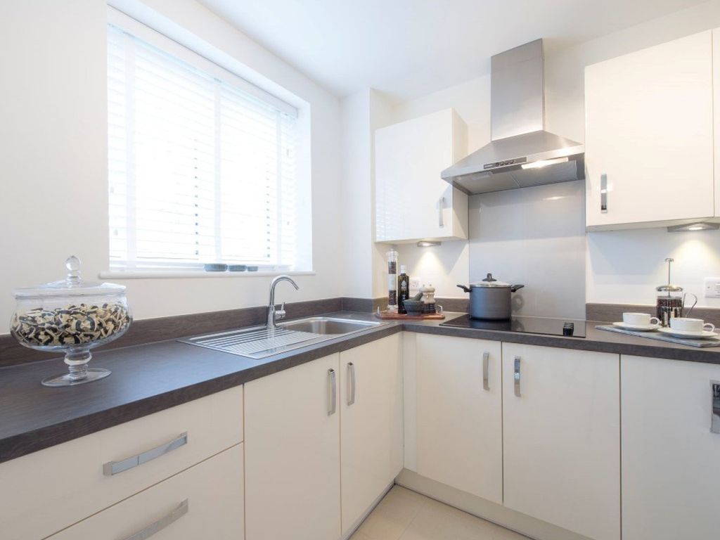Property photo 2 of 7 Typical Kitchen