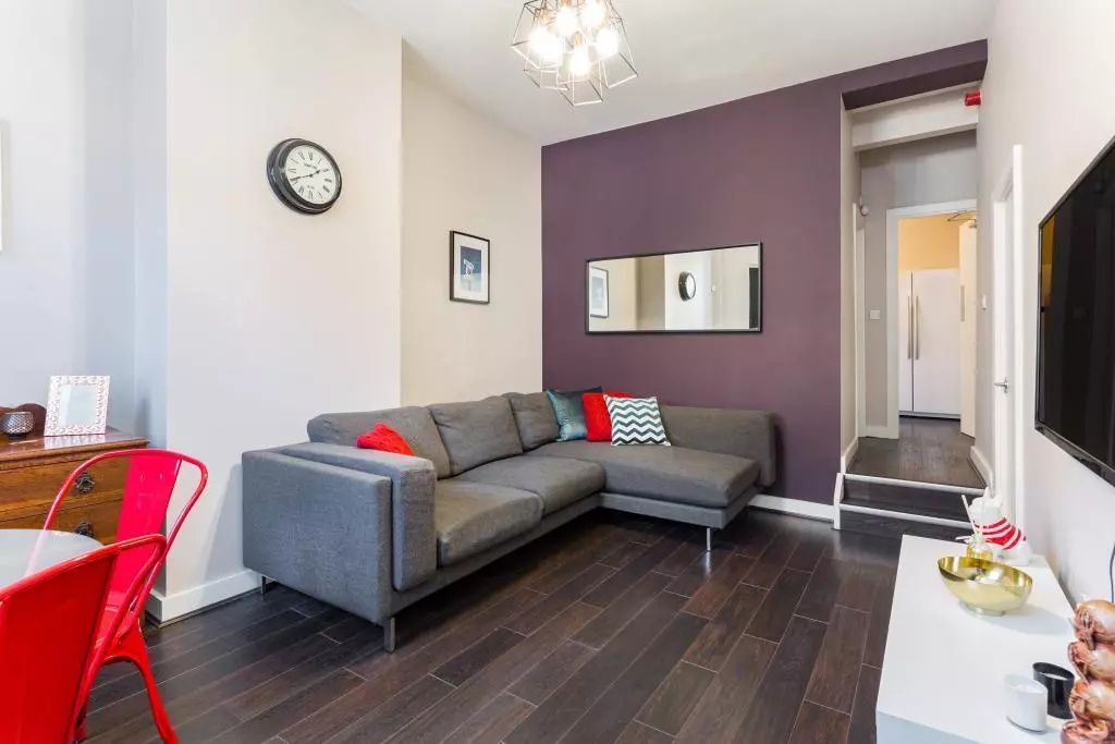 Property photo 3 of 12 A Modern Living Room Featuring A Stylish Grey L-Sh...