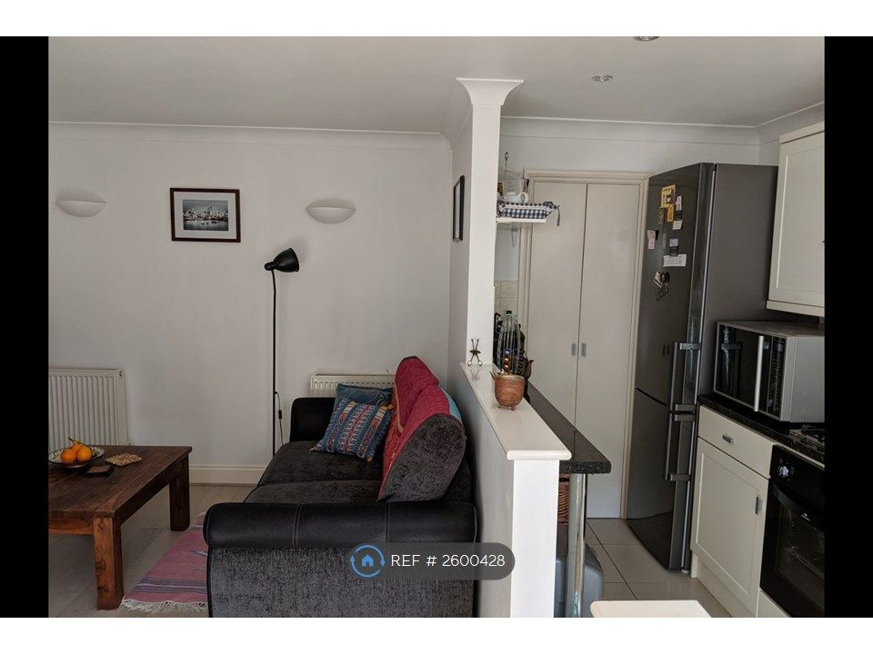 Property photo 2 of 11 Living Room And Open Kitchen