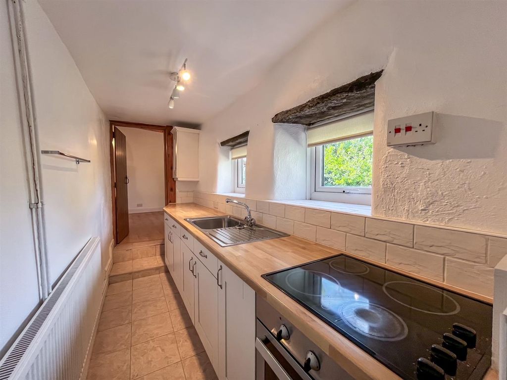 Property photo 2 of 12 Kitchen