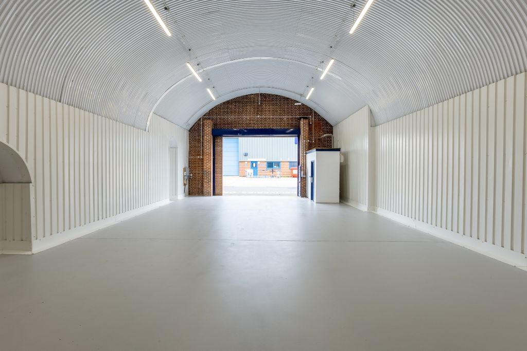Property photo 1 of 5 An Empty Arch With White Lining, Facing The Front Electric Roller Shutter Entrance, Which Is Open.