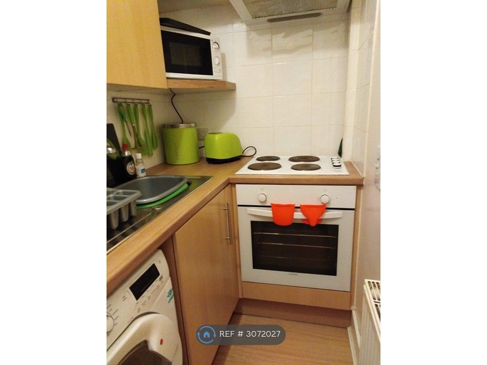 Property photo 3 of 9 Galley Kitchen