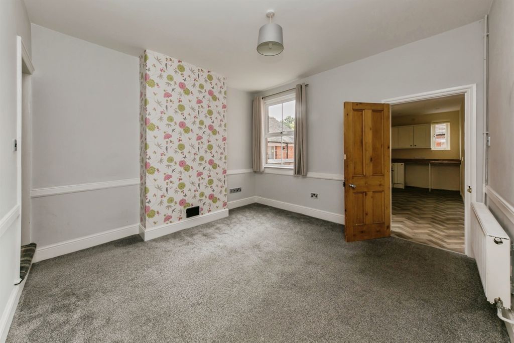Property photo 3 of 14 Dining Room: