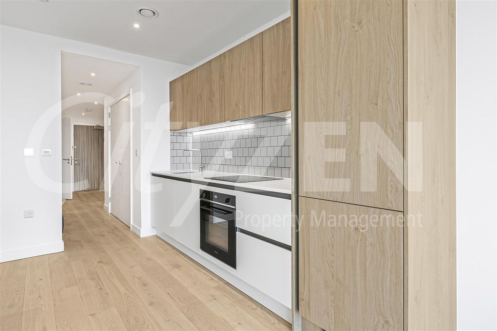 Property photo 3 of 33 Kitchen Area