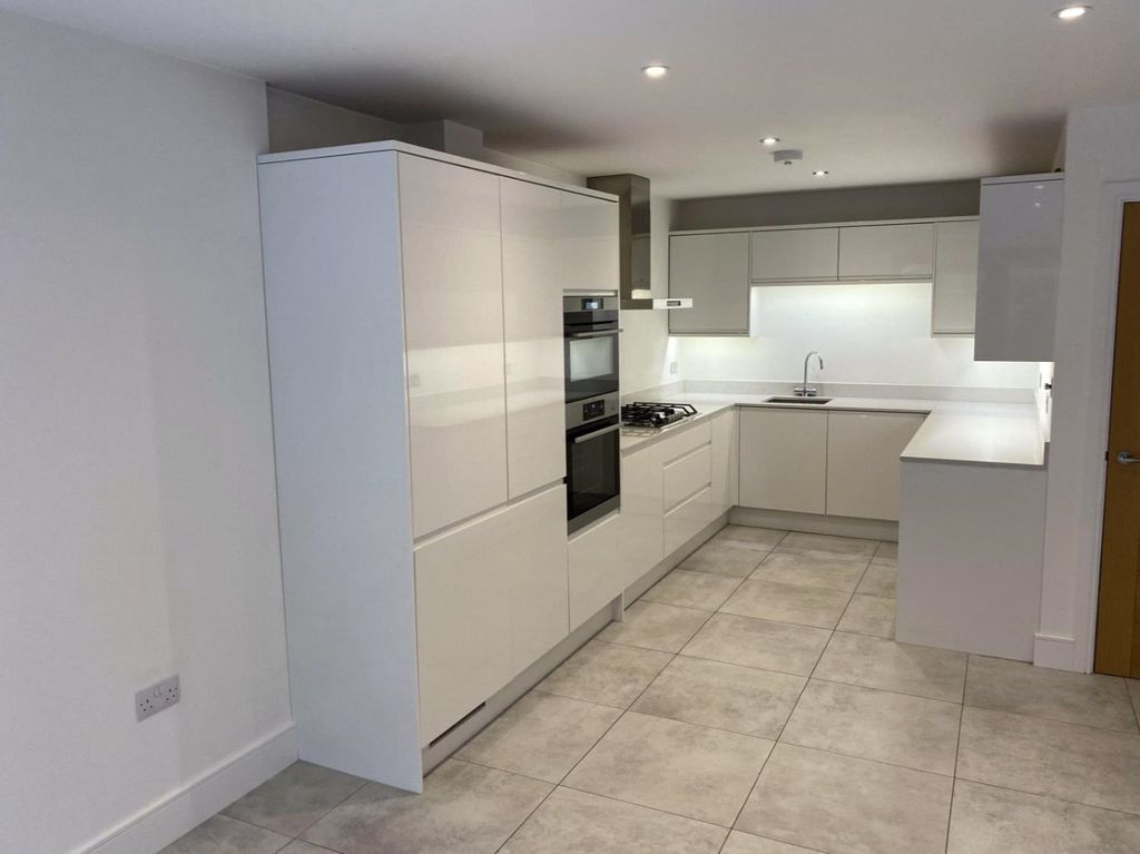 Property photo 2 of 12 Kitchen Area