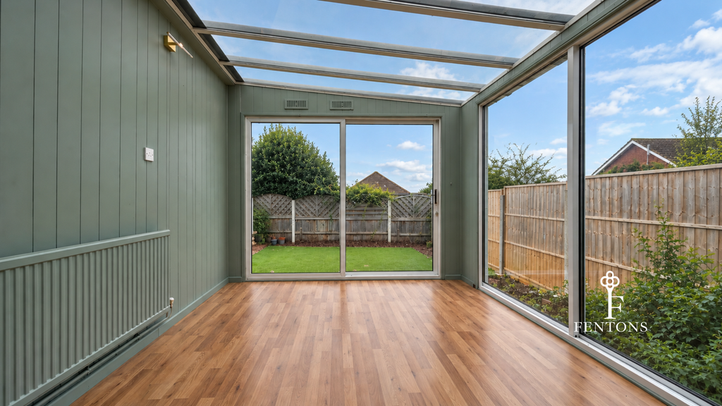 Property photo 3 of 18 Conservatory