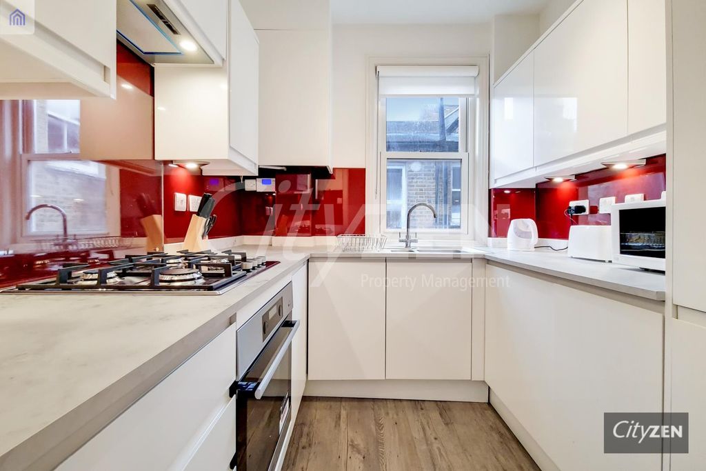 Property photo 3 of 13 Kitchen