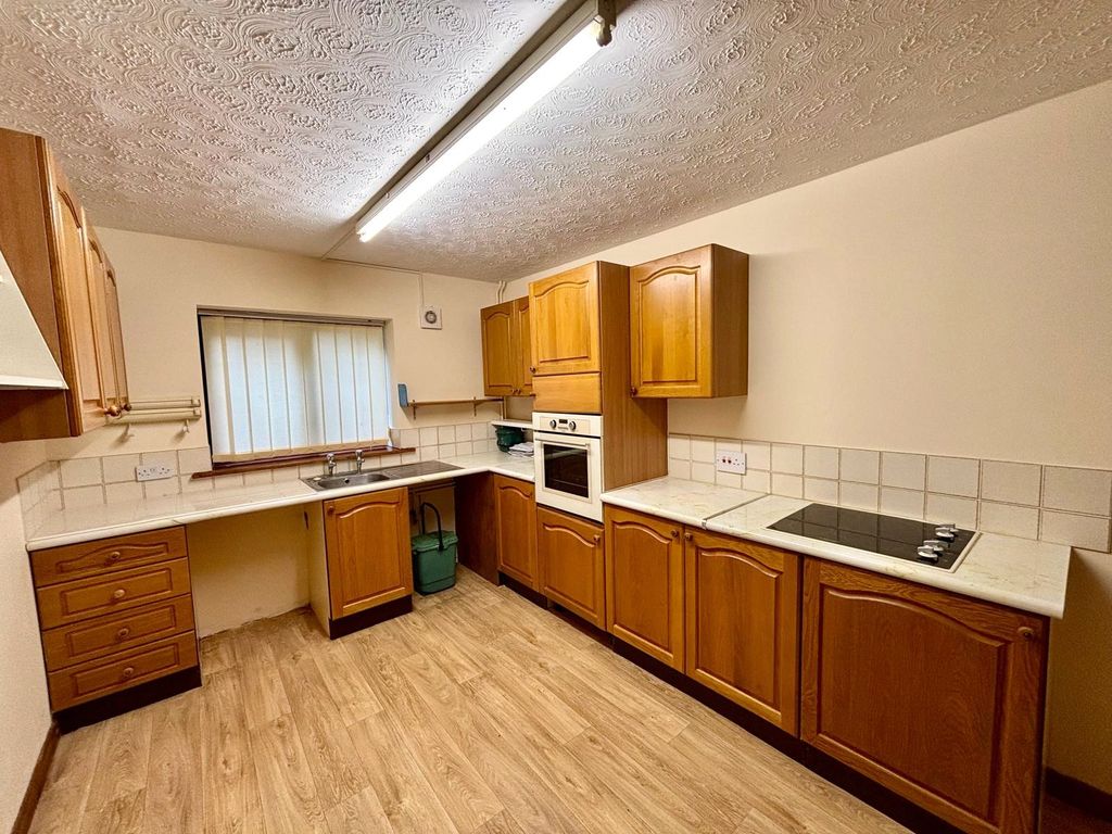 Property photo 2 of 12 Kitchen