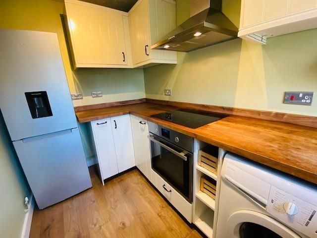 Property photo 3 of 11 Kitchen