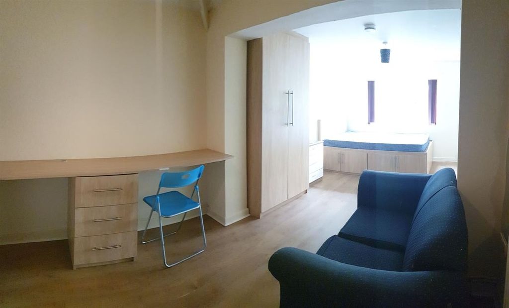 Property photo 2 of 8 Bright, Modern Living Area With Wood-Effect Floori...