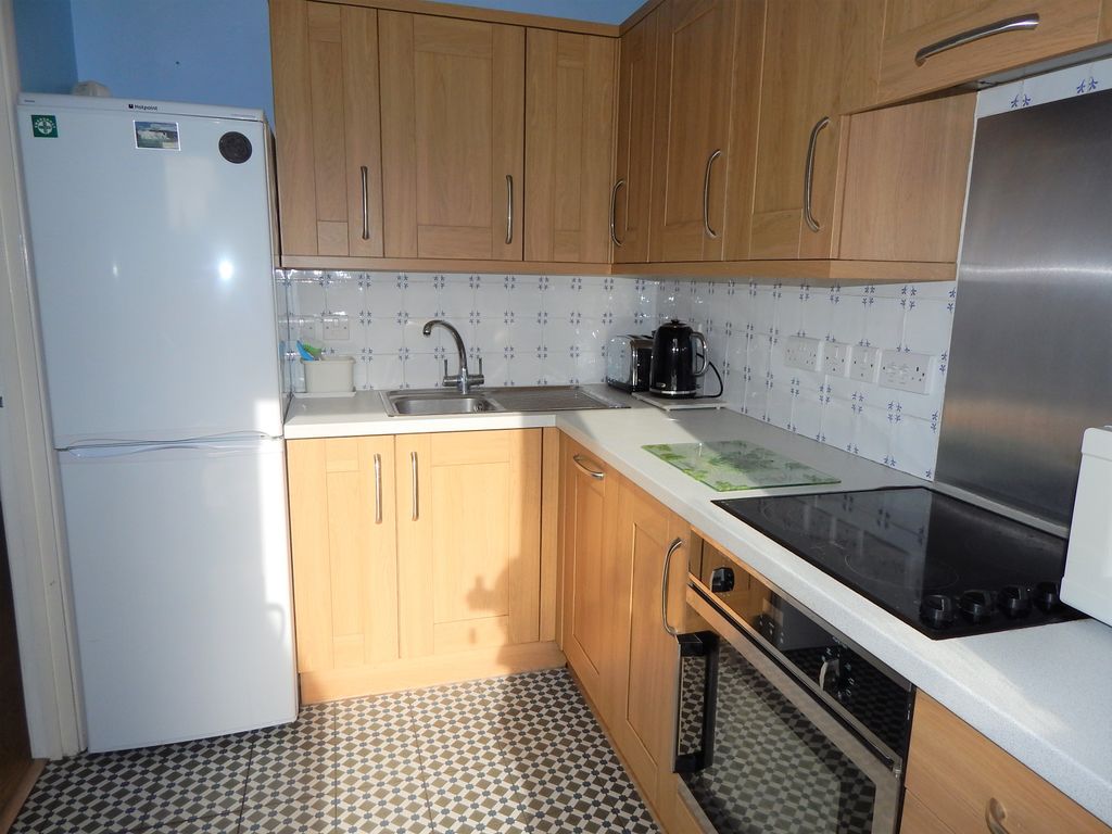 Property photo 2 of 12 Kitchen