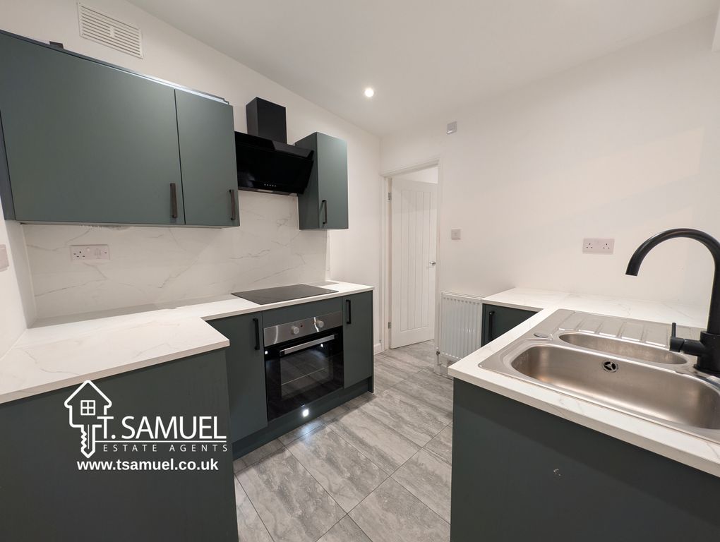 Property photo 2 of 17 Kitchen