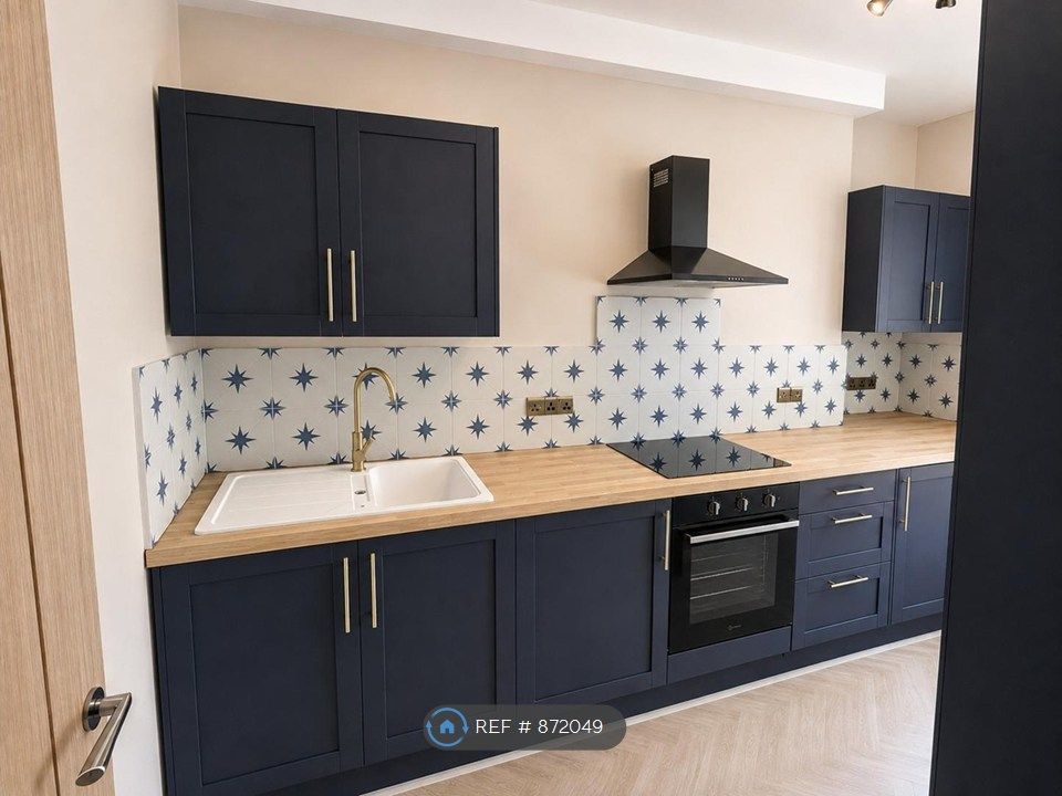 Property photo 3 of 8 Kitchen