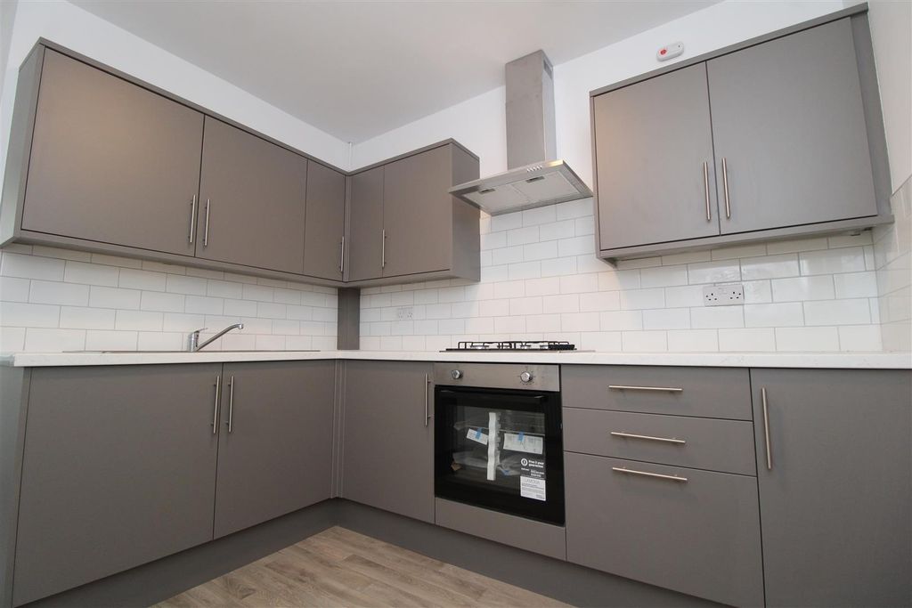 Property photo 2 of 24 Modern Sleek Kitchen With Stylish Grey Cabinetry...