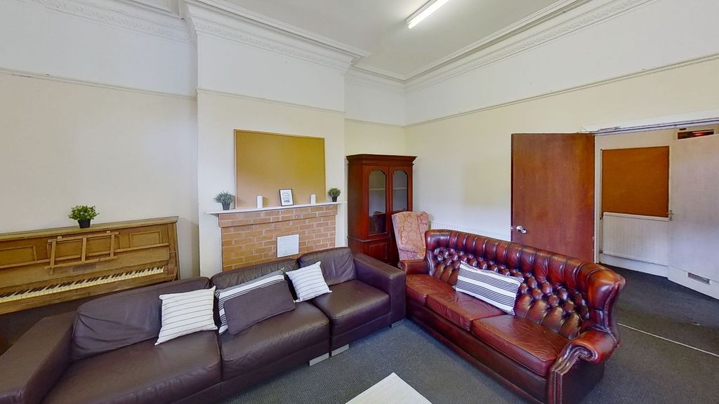 Property photo 3 of 16 Living