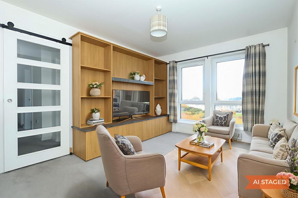 Property photo 3 of 12 Lounge - Staged