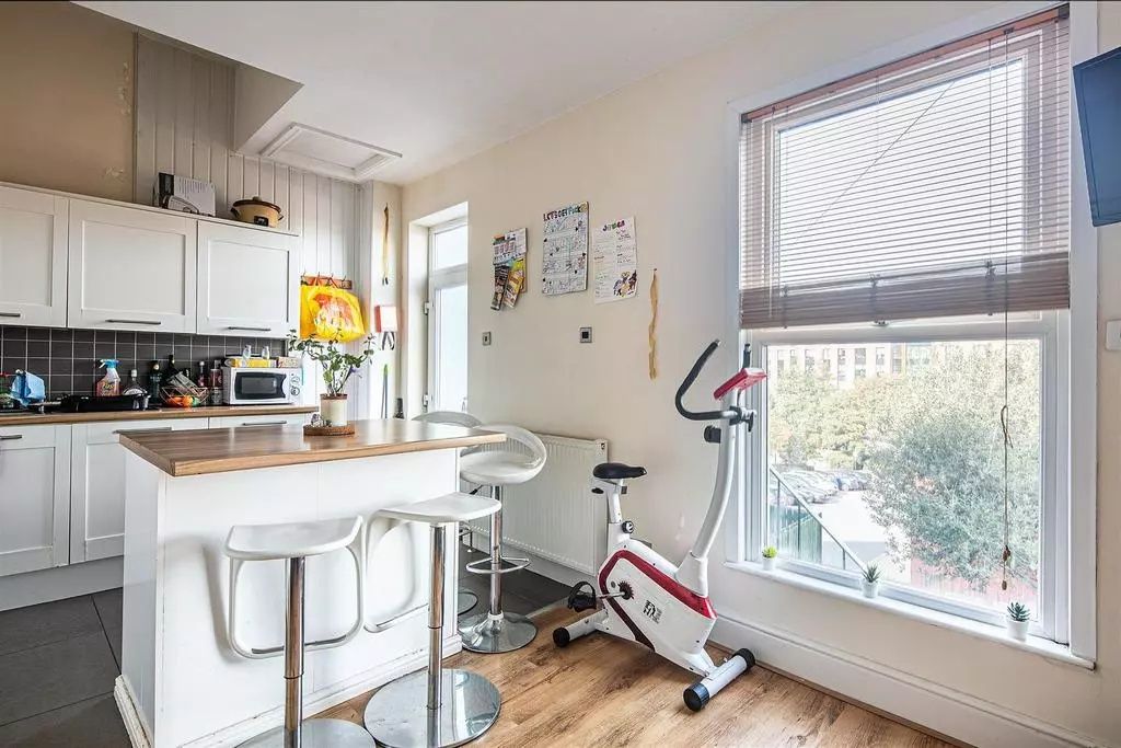 Property photo 3 of 9 Bright And Modern Kitchen Featuring A Breakfast Ba...