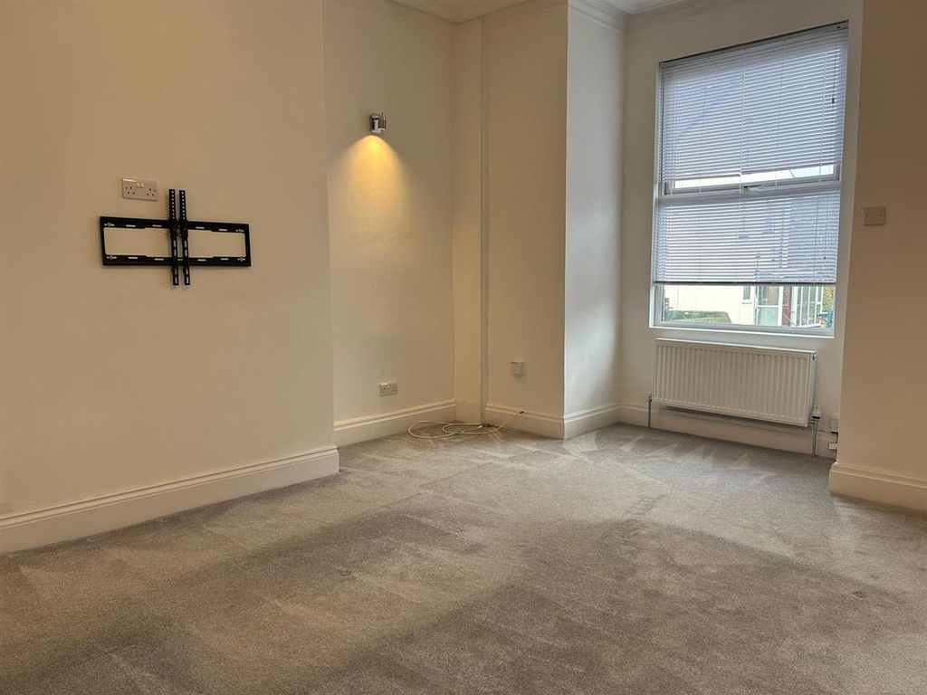 Property photo 2 of 12 Living Room: