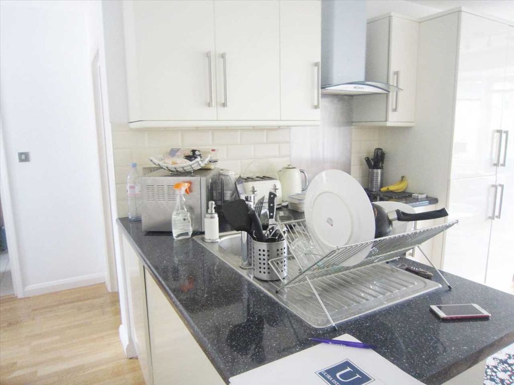 Property photo 3 of 7 Kitchen