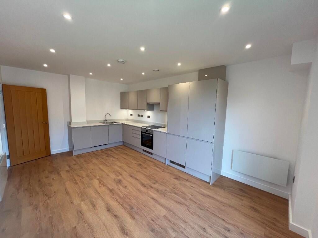 Property photo 3 of 6 Kitchen Living Area