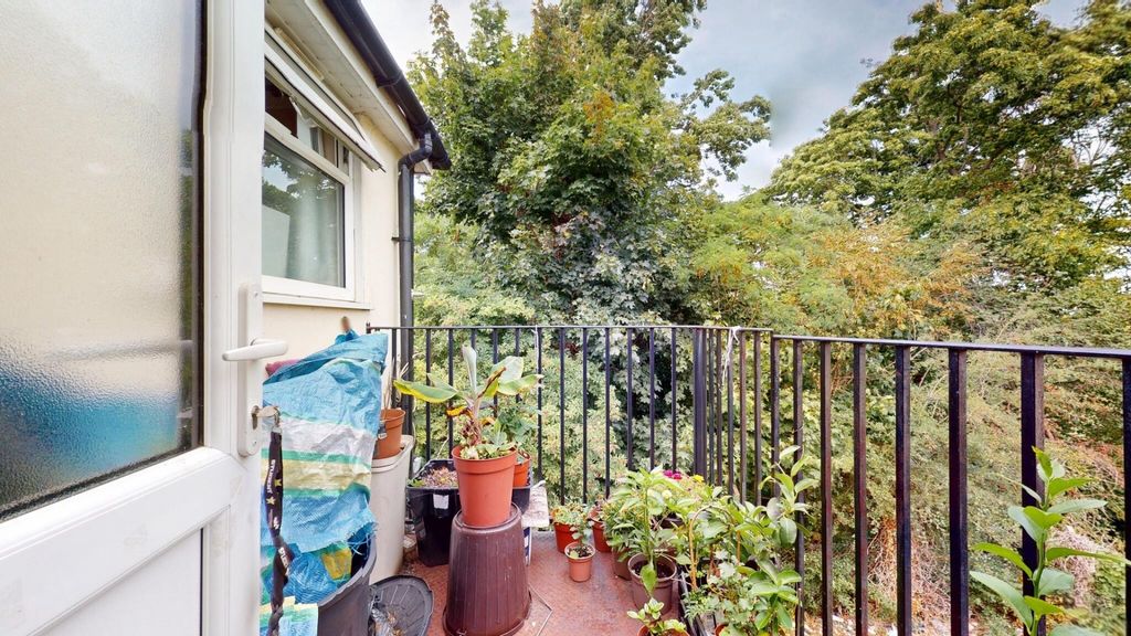 Property photo 1 of 14 A Charming Balcony Garden Space Featuring Lush Gre...