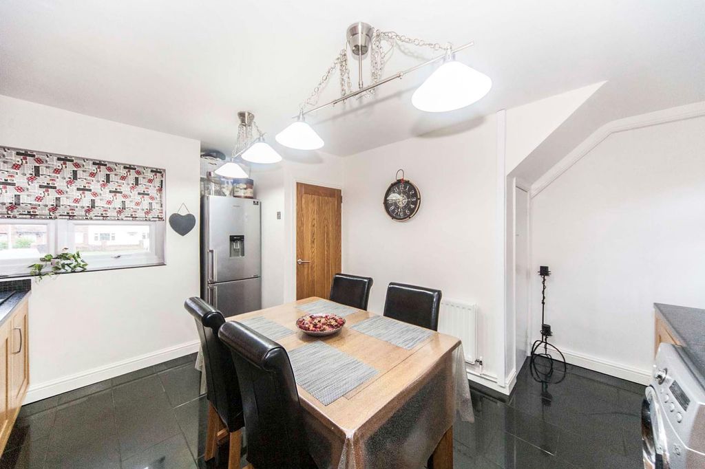 Property photo 3 of 8 Dining Room