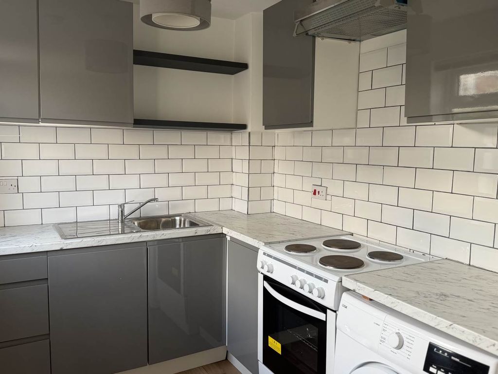 Property photo 2 of 8 Kitchen