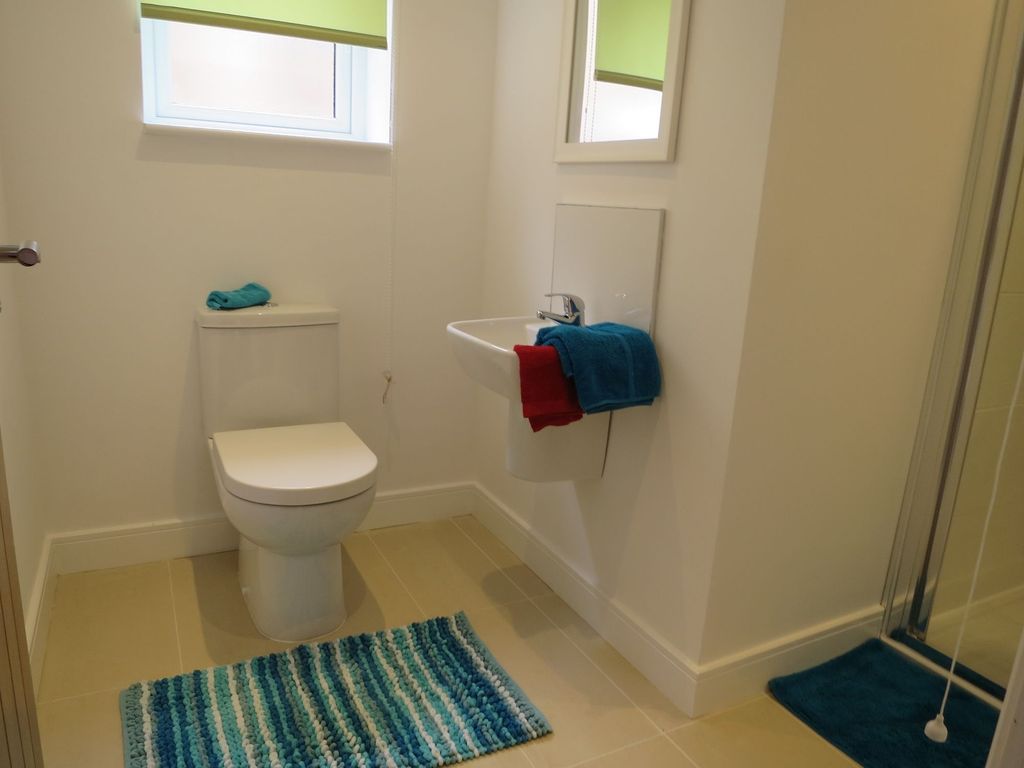 Property photo 3 of 9 Bright And Tidy Bathroom Featuring A Toilet, Small...