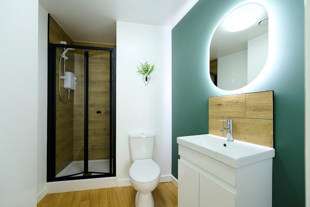 Property photo 3 of 14 A Modern Bathroom Suite Featuring A Sleek Walk-In ...