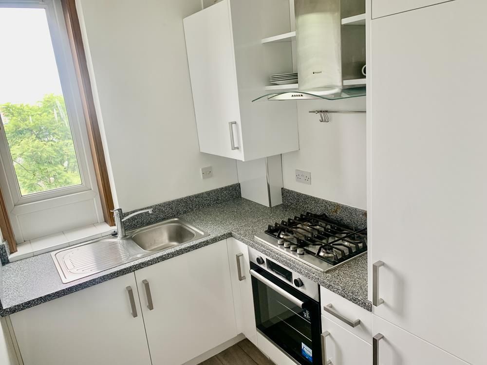 Property photo 3 of 8 Kitchen