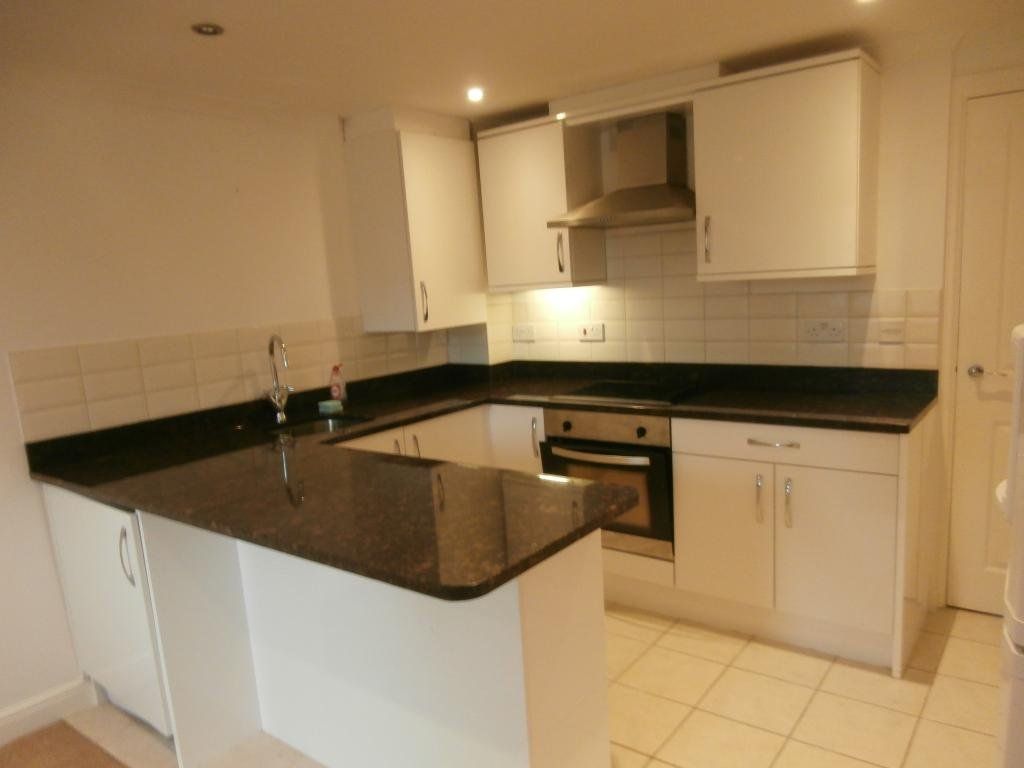 Property photo 2 of 7 Kitchen Area