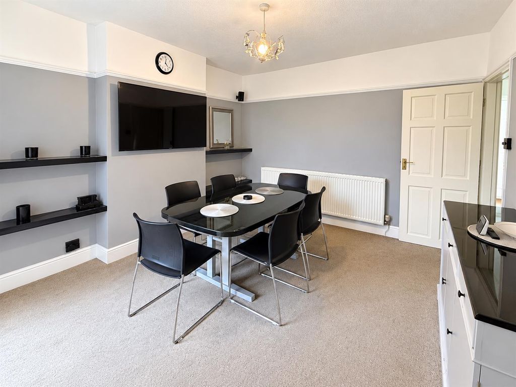 Property photo 3 of 11 Modern Grey And Black Dining Room.Png