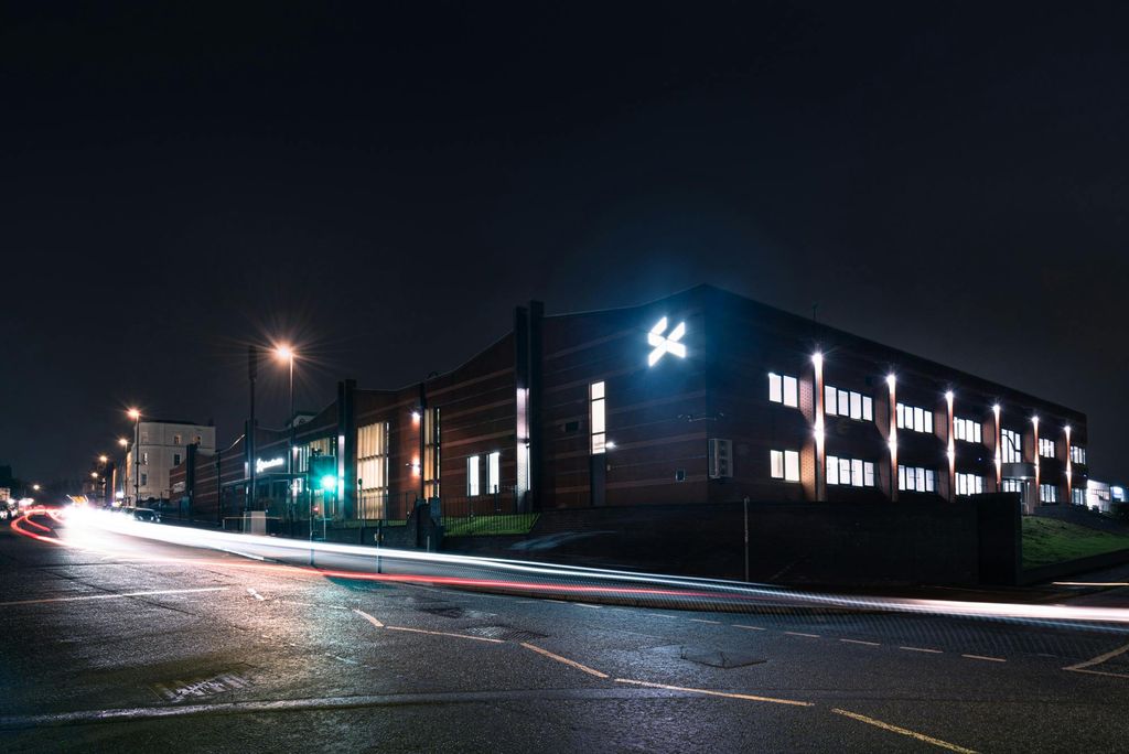 Property photo 2 of 9 Om Exterior Night Shot.Jpg