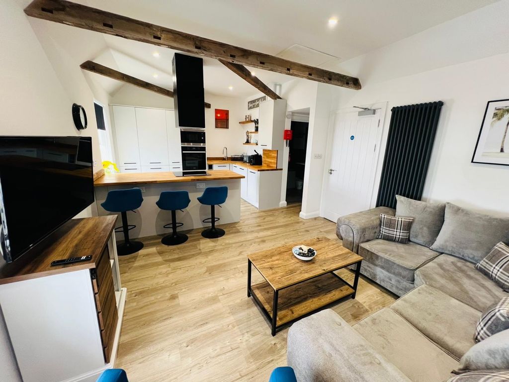 Property photo 3 of 12 Living Room