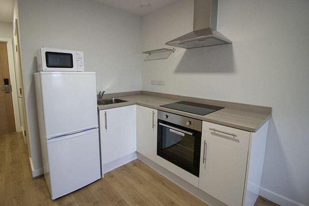 Property photo 3 of 4 Modern Kitchen Equipped With Essential Appliances,...