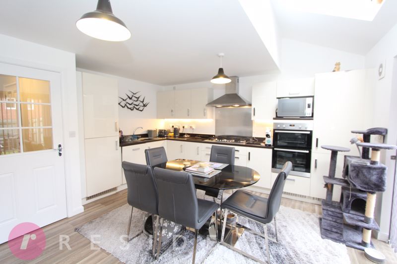 Property photo 3 of 17 Dining Kitchen