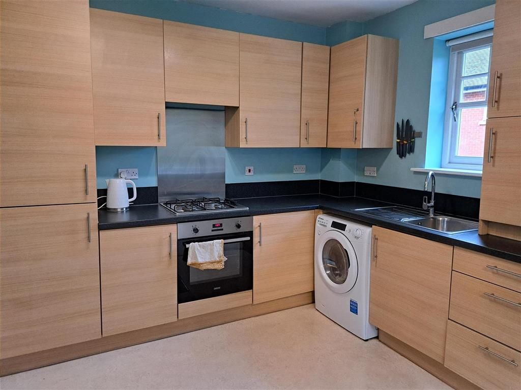 Property photo 2 of 12 Kitchen