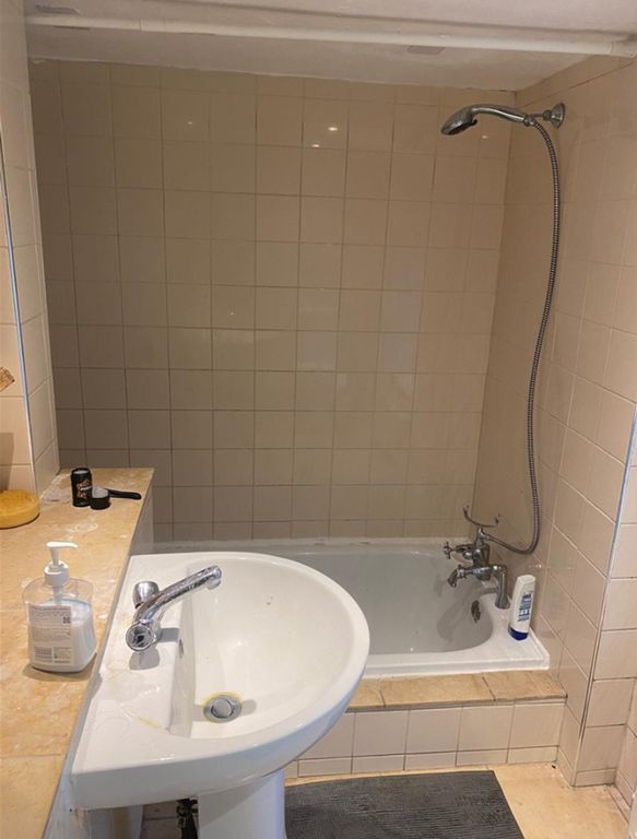 Property photo 1 of 4 A Functional Bathroom Featuring A Combination Bath...