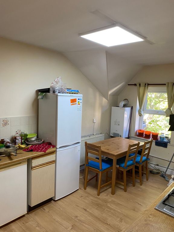 Property photo 2 of 5 A Practical And Well-Used Kitchen Area Featuring A...