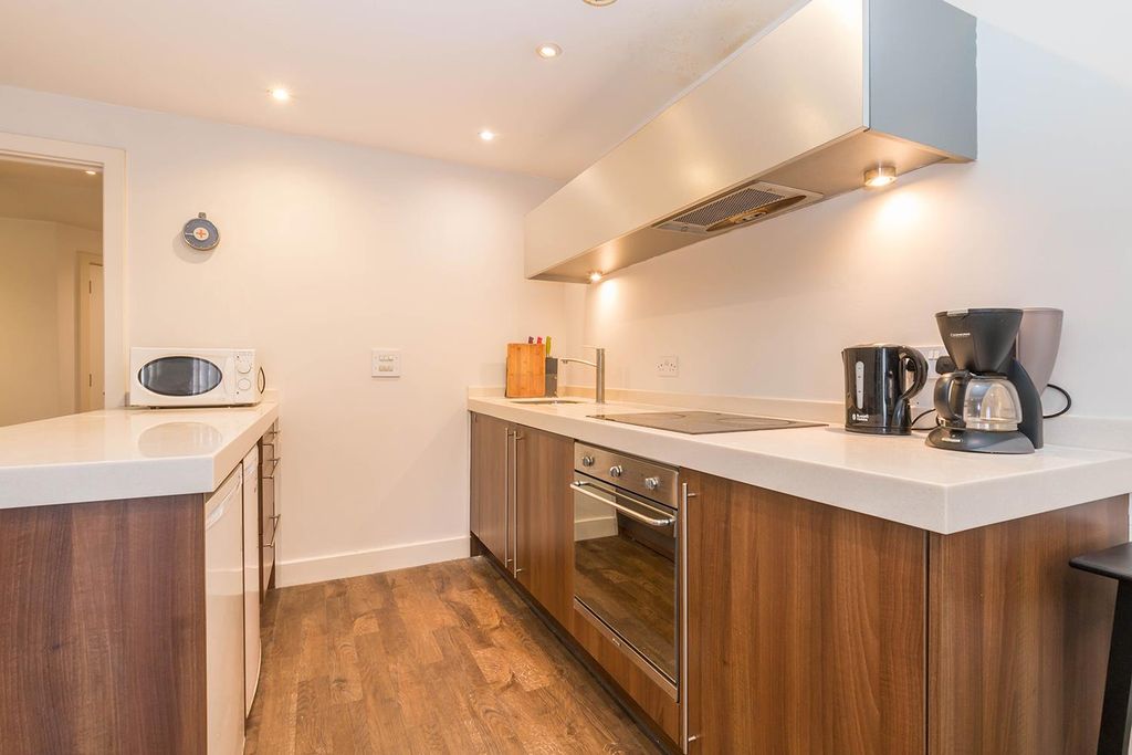 Property photo 3 of 12 Kitchen