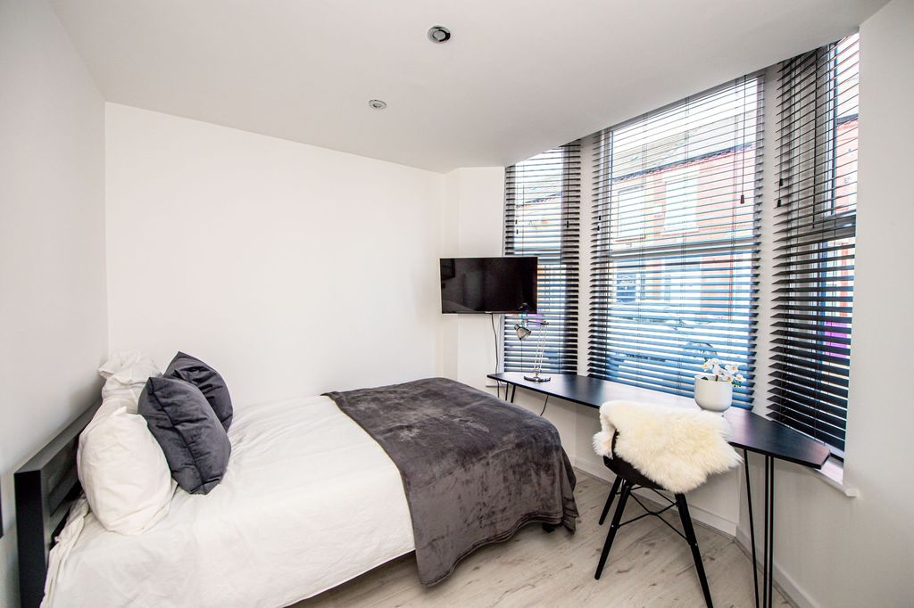 Property photo 3 of 9 Bright And Modern Master Bedroom Featuring A Spaci...