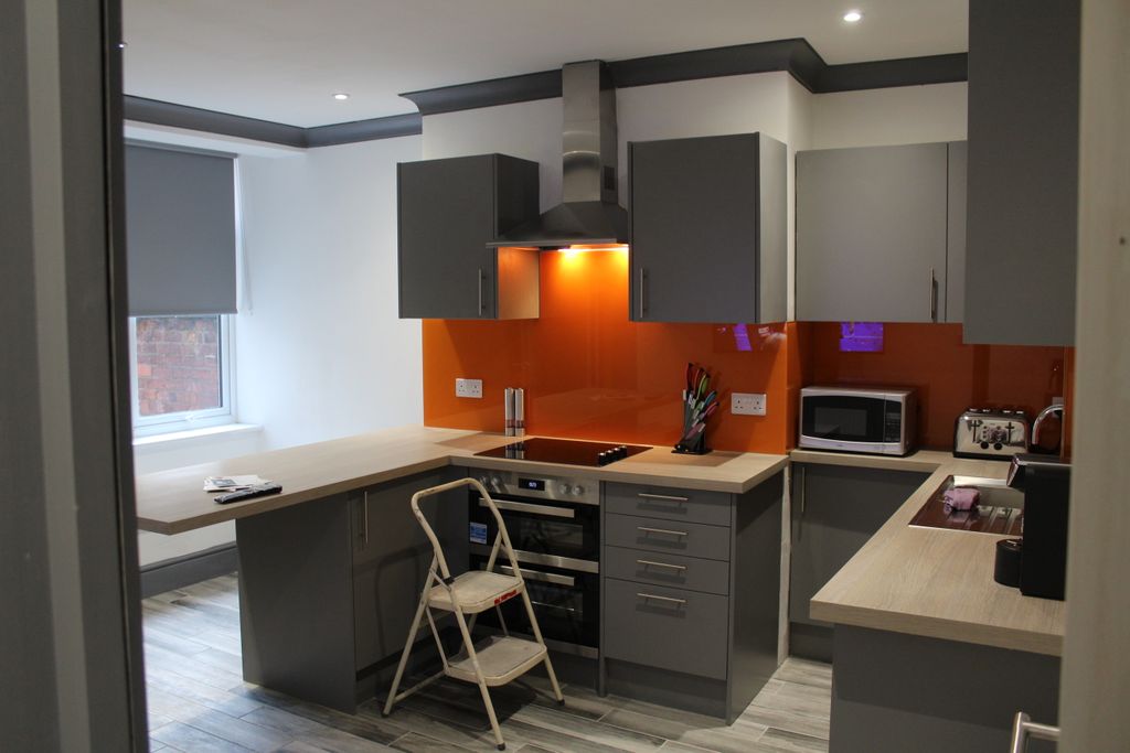 Property photo 2 of 12 Kitchen