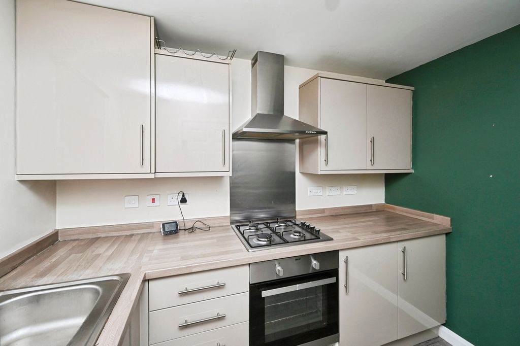 Property photo 2 of 12 Kitchen